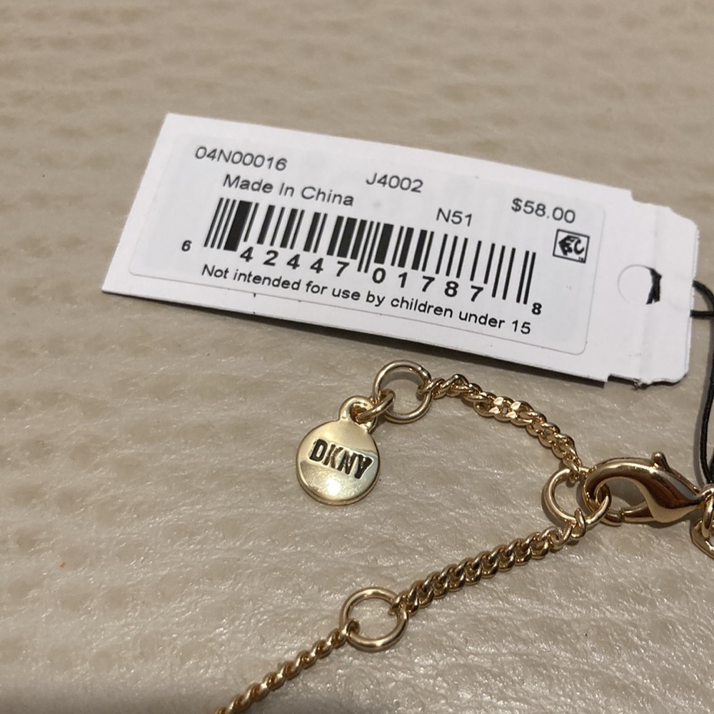 DKNY
Gold-Tone Curved Bar Link Necklace - Picture 8 of 10